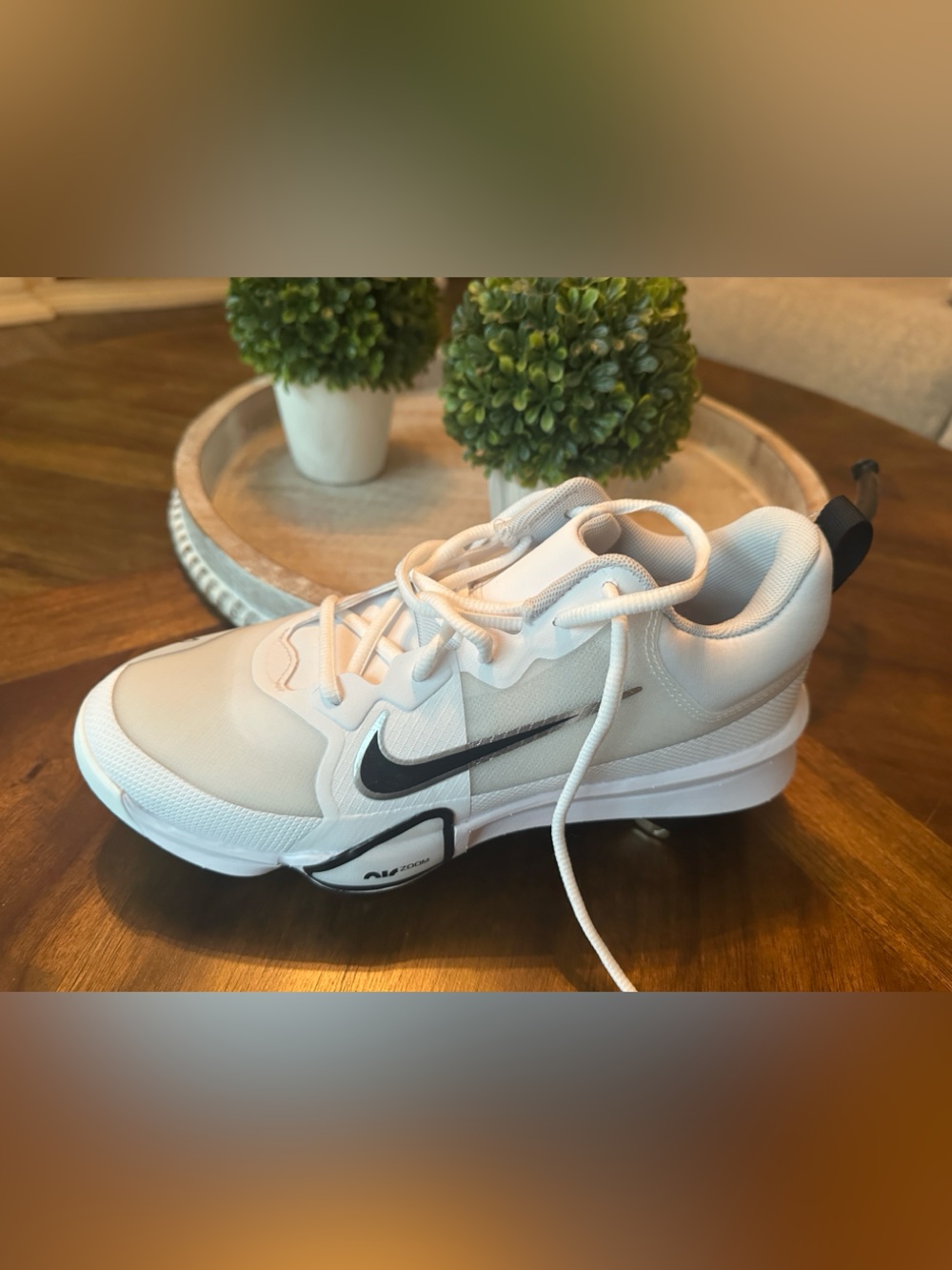 Nike White and Black Baseball Cleats with Silver Swoosh